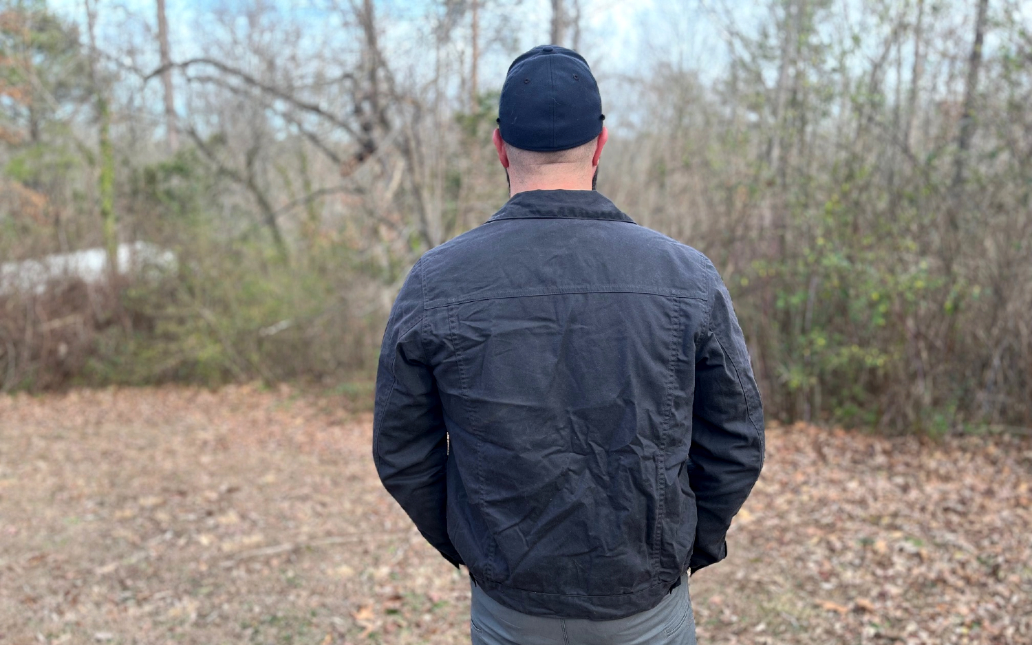 Wearing Flint and Tinder Flannel-Lined Waxed Trucker Jacket Back View 